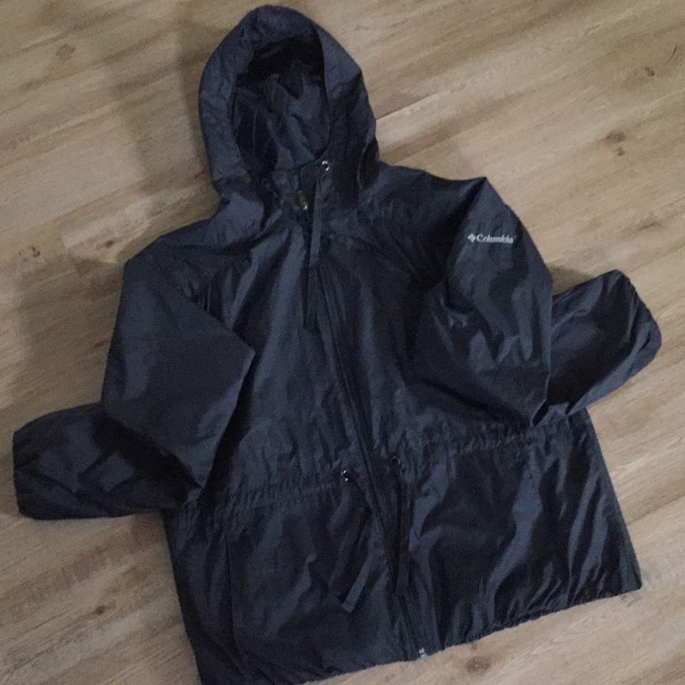 NEW!! Columbia women’s XL rain jacket. Black.